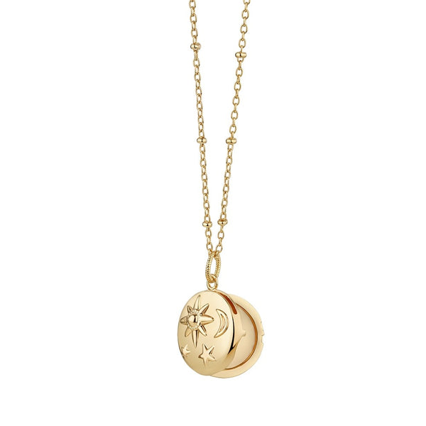 NEWBRIDGE SILVERWARE GOLD PLATED LOCKET WITH SUN MOON & STARS